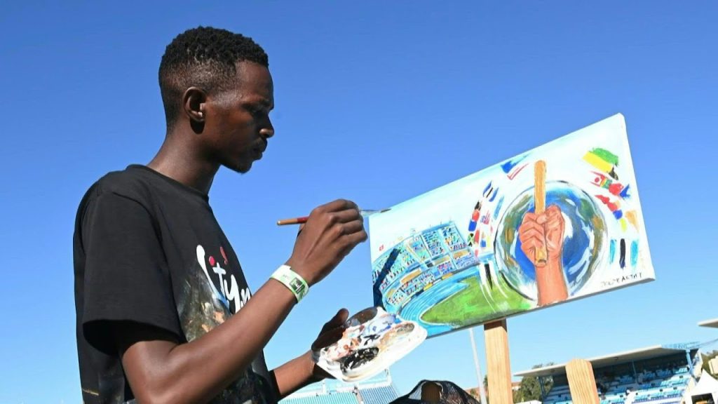 Botswanan artists portray the World Athletics Relays through live painting.